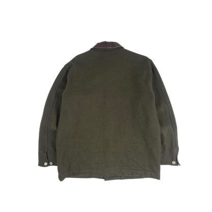 olive green Stüssy jacket features a dark brown corduroy collar