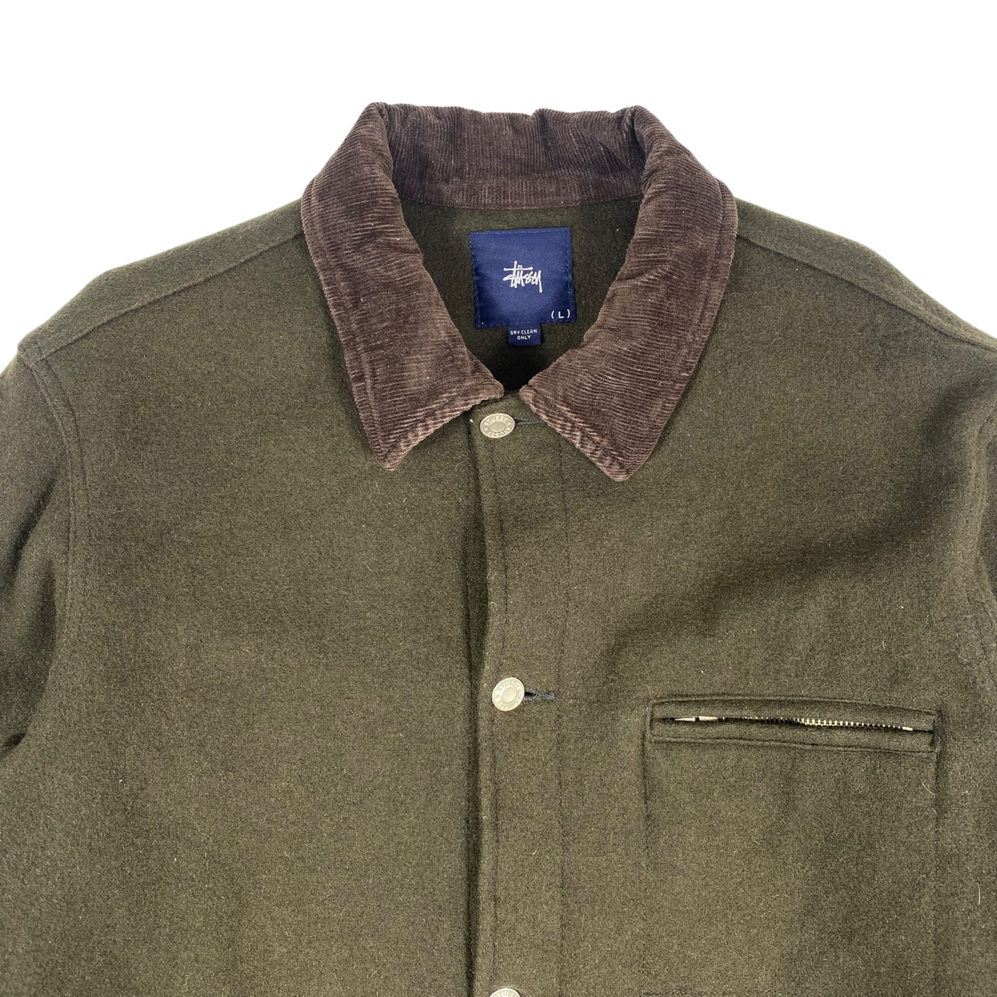 olive green Stüssy jacket features a dark brown corduroy collar